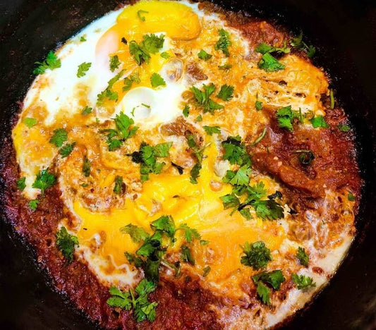 Shakshuka with Poached Eggs and Spicy Tomato Sauce