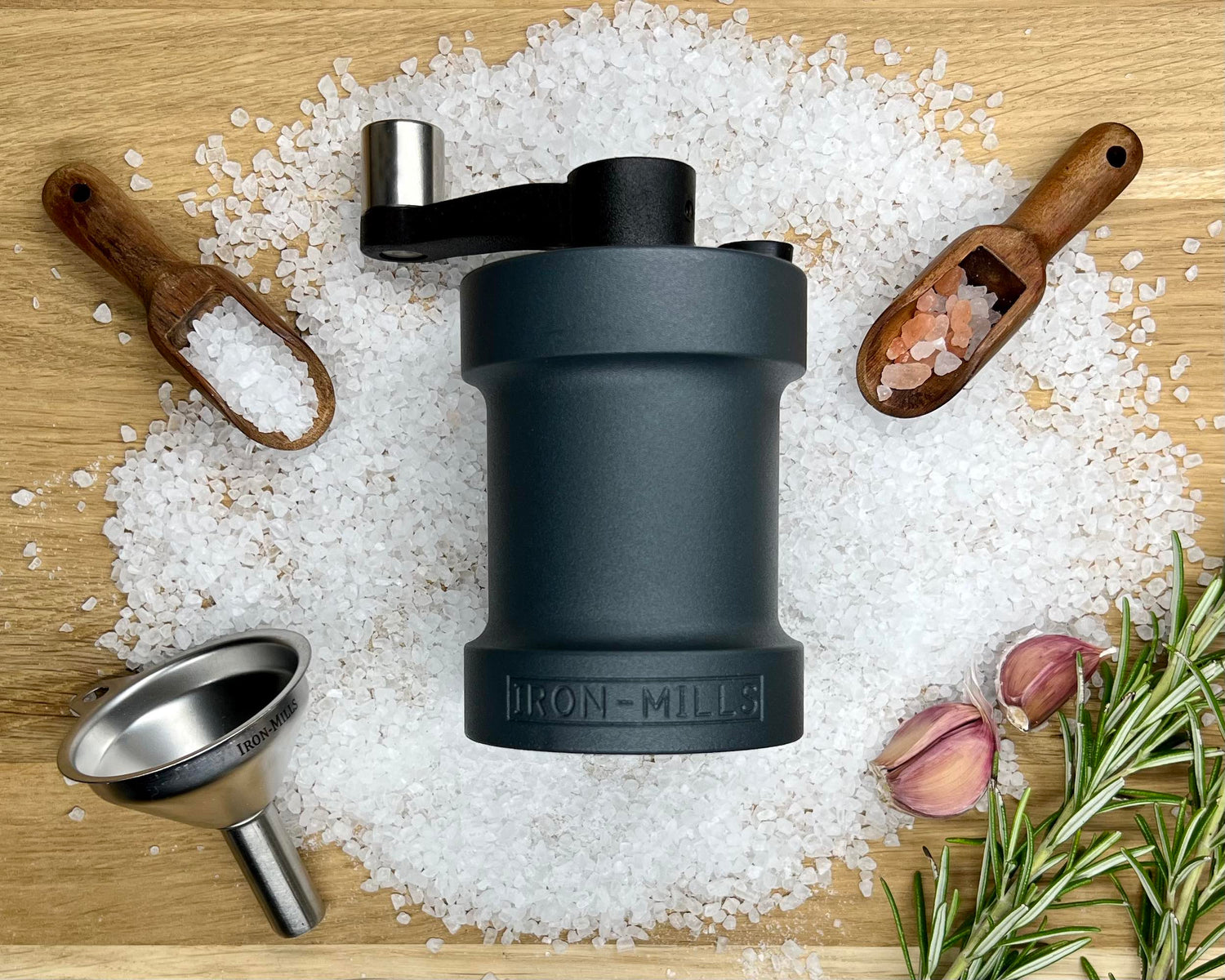 The Anthracite Mill from Iron-Mills - Quality Cast Iron Salt & Pepper Grinders on a bed of Rock Salt